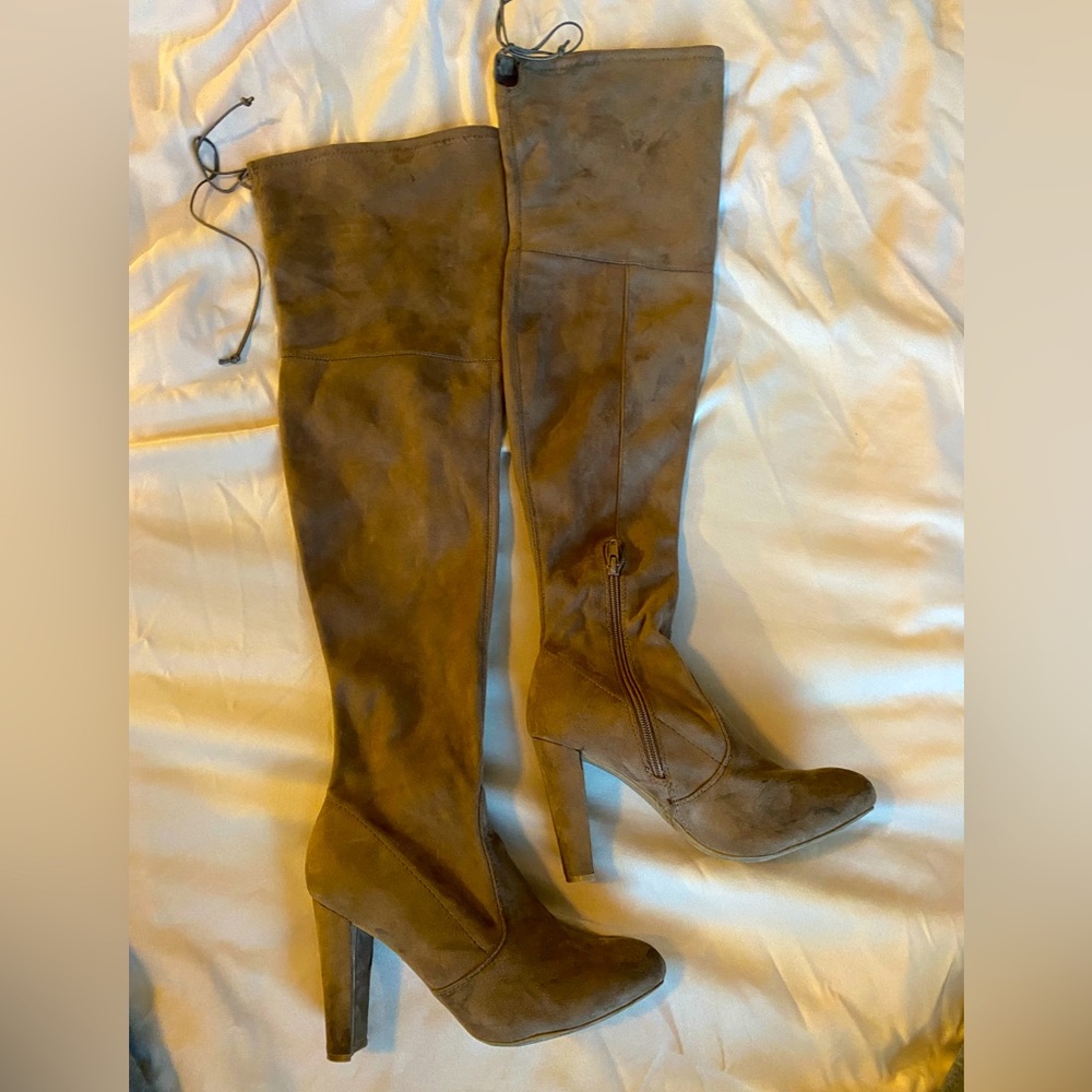 Knee high tan high heel boots